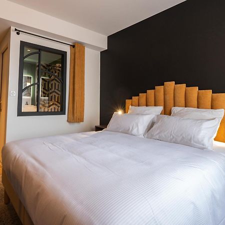 Hotel Les Pins แซ็ง-โทรจง-เลส์-แบ็งส์ ภายนอก รูปภาพ
